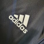 Real Madrid Windbreaker 2023-2024 - Schwarz Lila